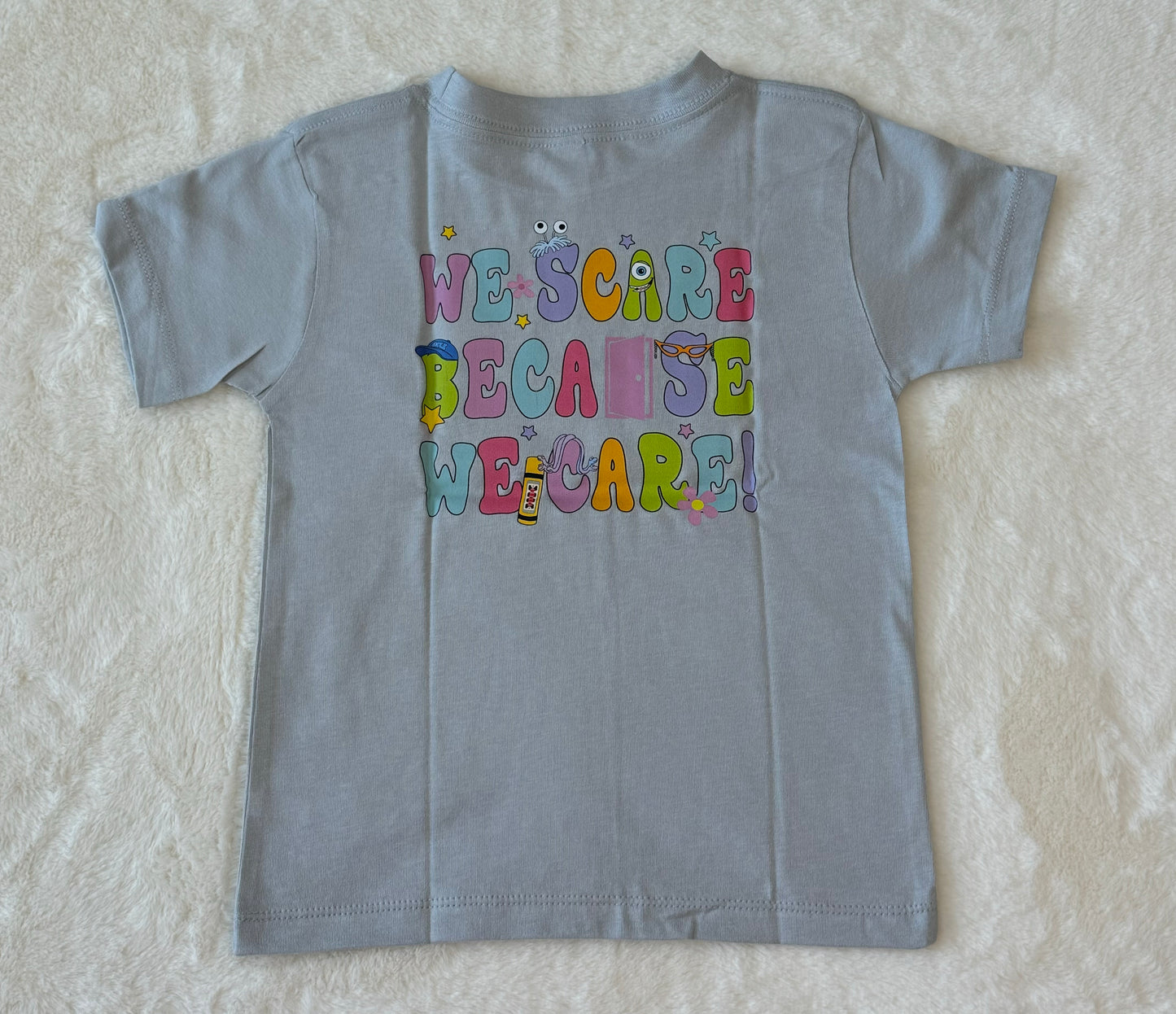Gray We Scare Because We Care T-Shirt